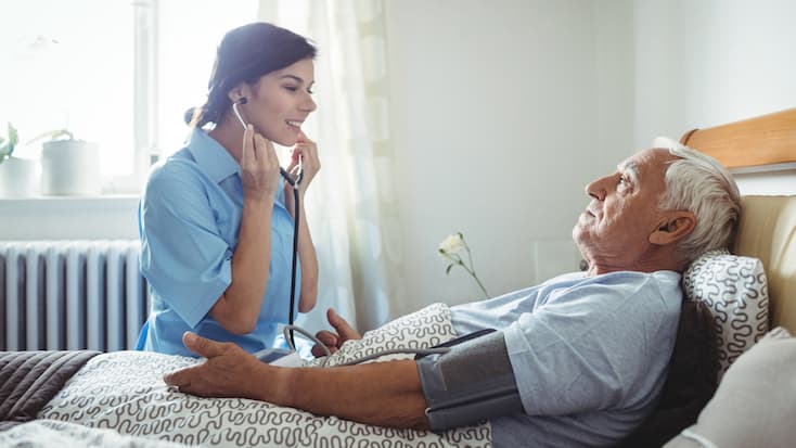 Resident Having Blood Pressure Taken