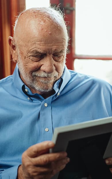 A resident looking at a photo