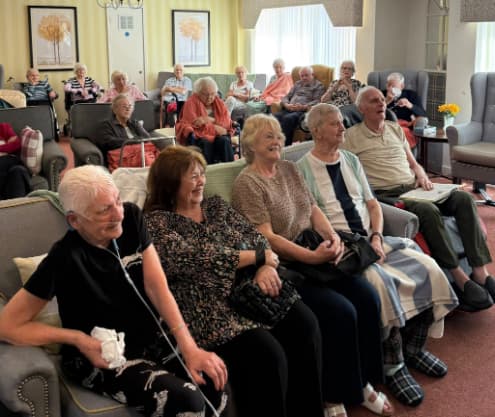Residents enjoying activity in the lounge