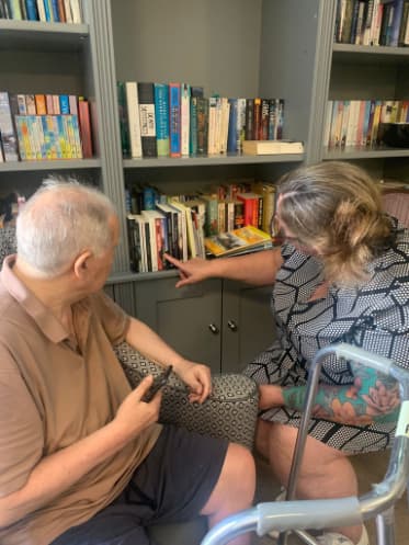 Resident looking at Welsh Library